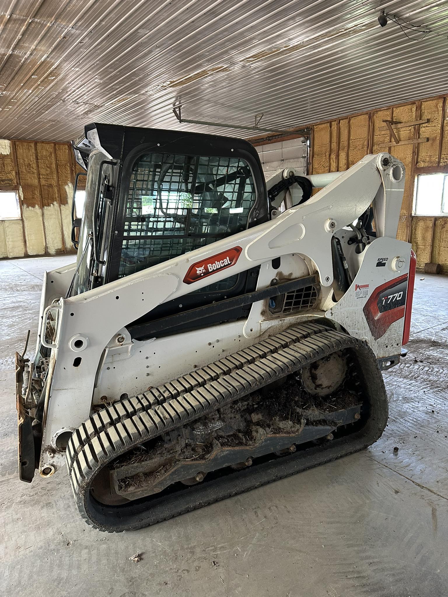 Bobcat T770 compact track loader in shop